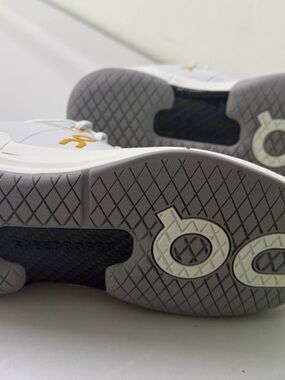 Women's White Sneakers with Gray Soles and Gold Logo Accent